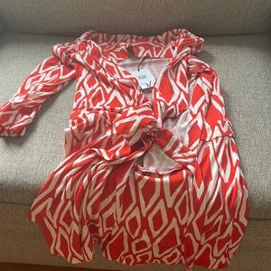 Gorgeous orange and white DVF romper with long sleeves.